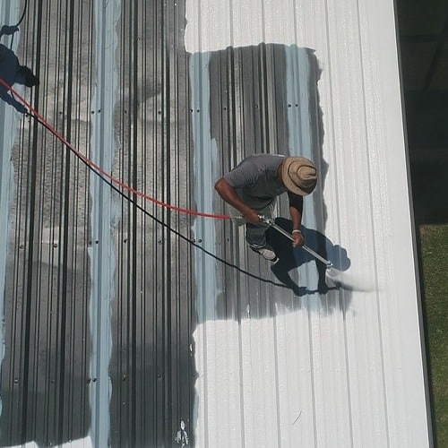 A metal roof coating application